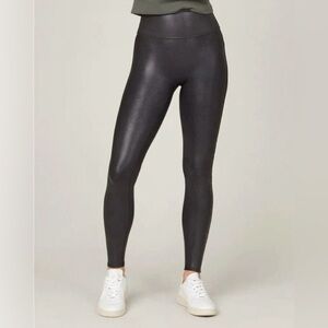 Spanx black faux Leather Leggings in size XS compression mid rise casual